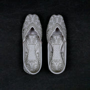 Off White Textured Rexine Closed Toe Jutti