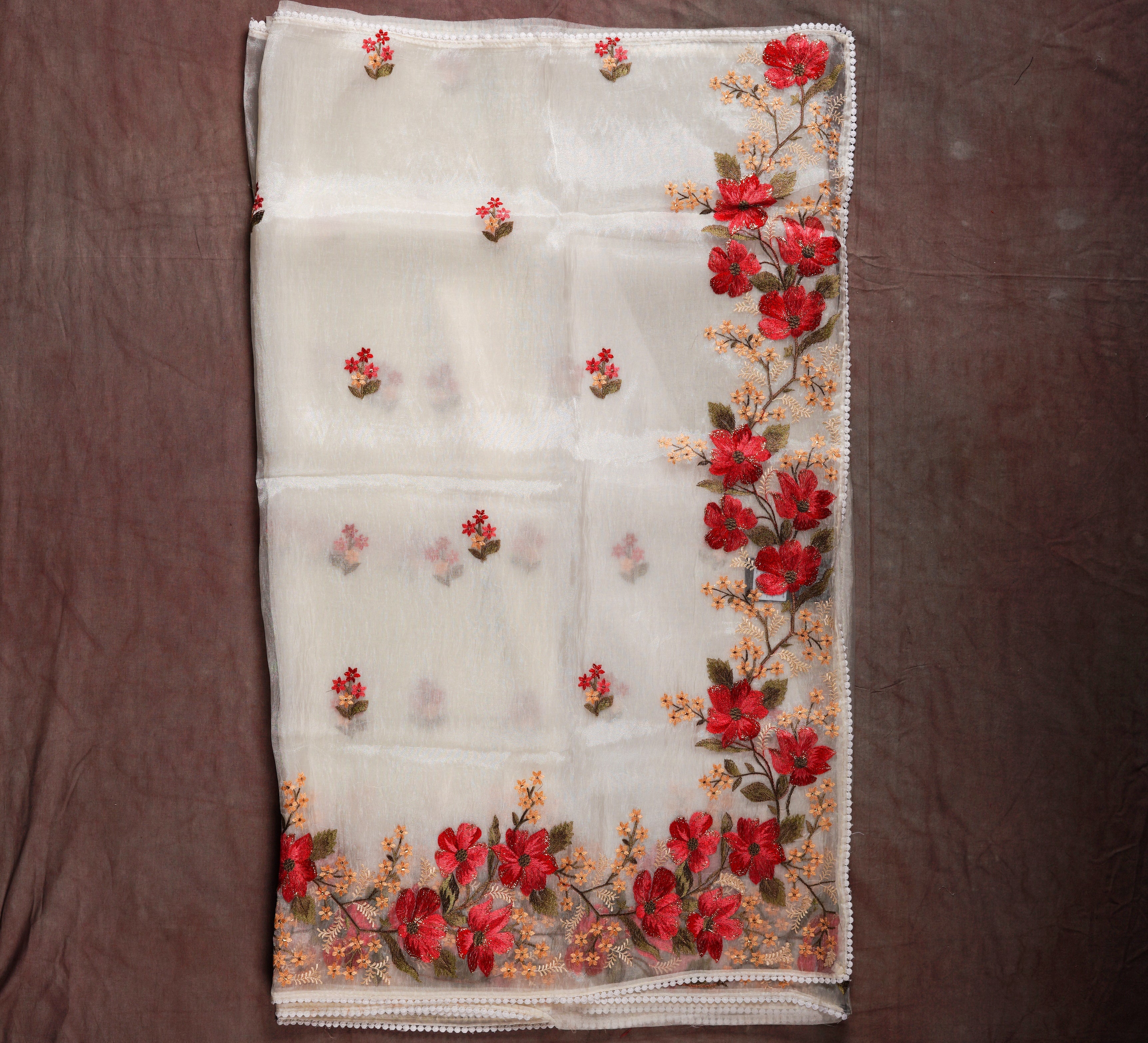 Unveil Timeless Beauty with an Off White Organza Silk Saree