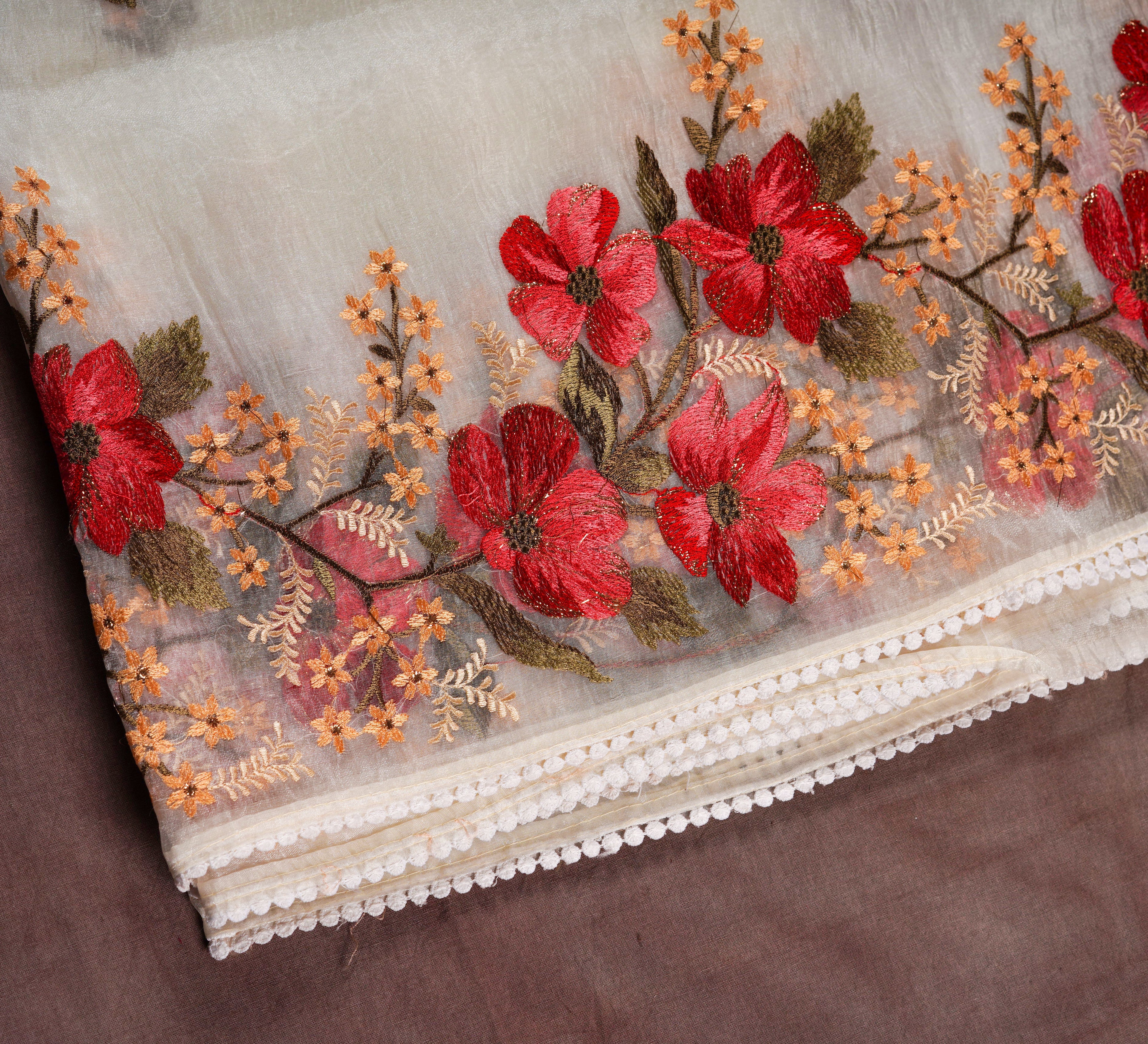 Unveil Timeless Beauty with an Off White Organza Silk Saree