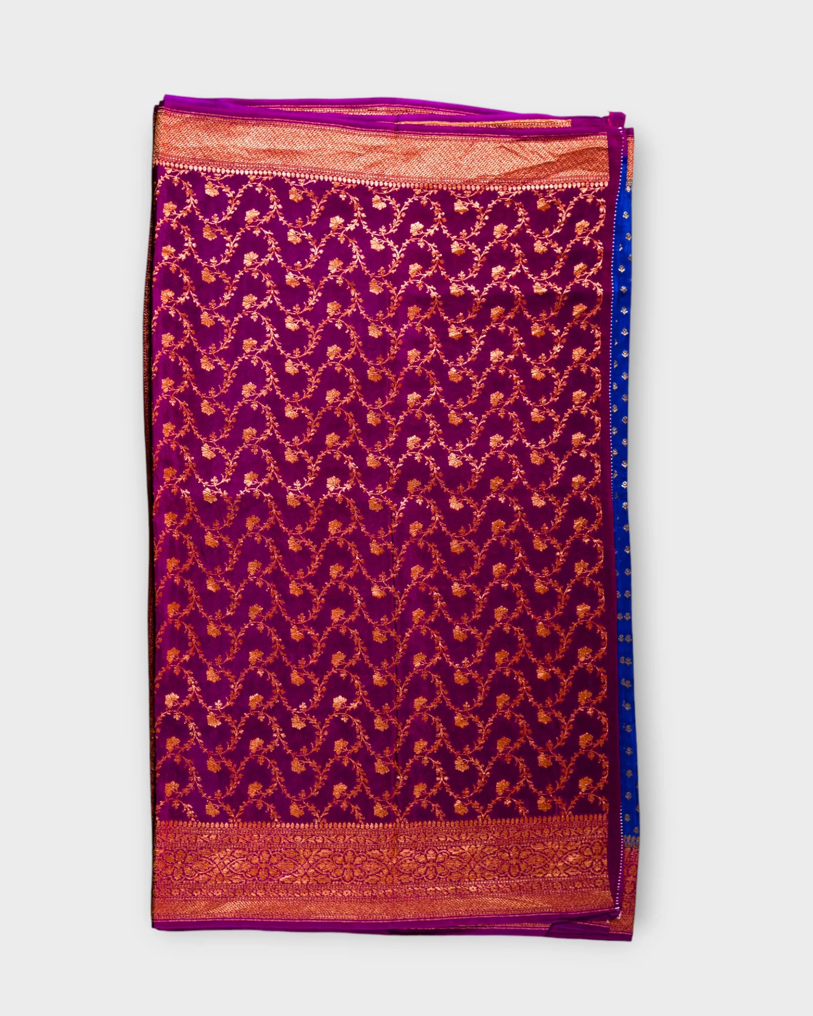 Peacock Blue Georgette Zari Woven Saree