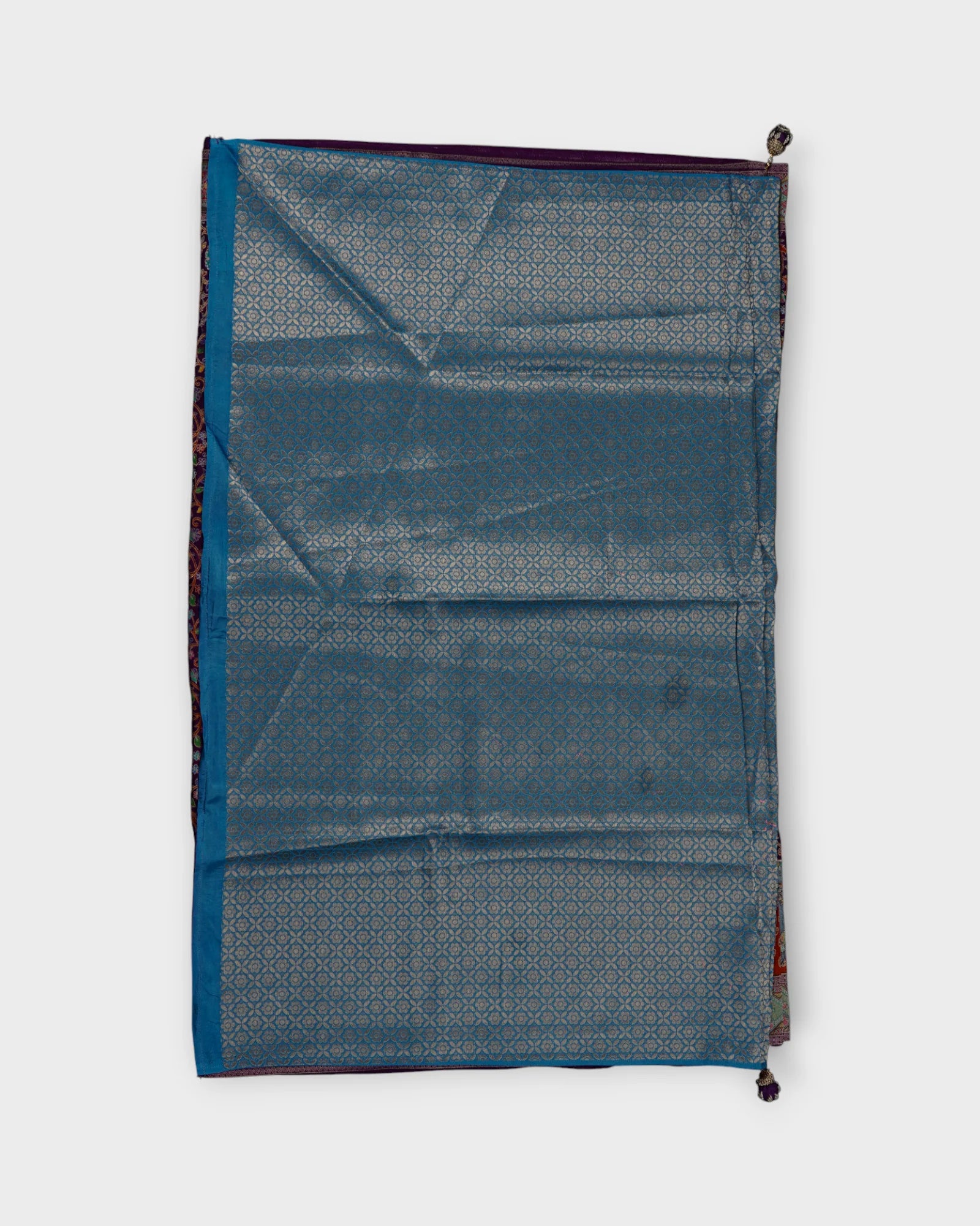 Sky Blue Dola Silk Saree with Minakari Charm