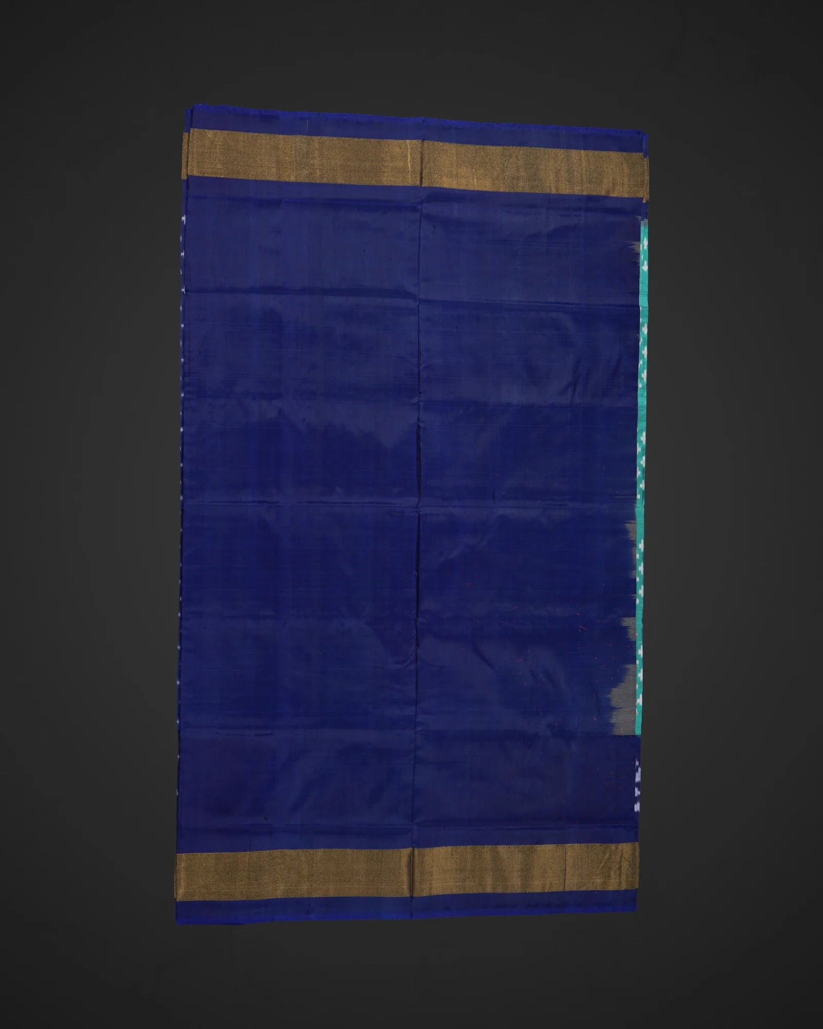 Teal Ikkat Silk Woven Saree