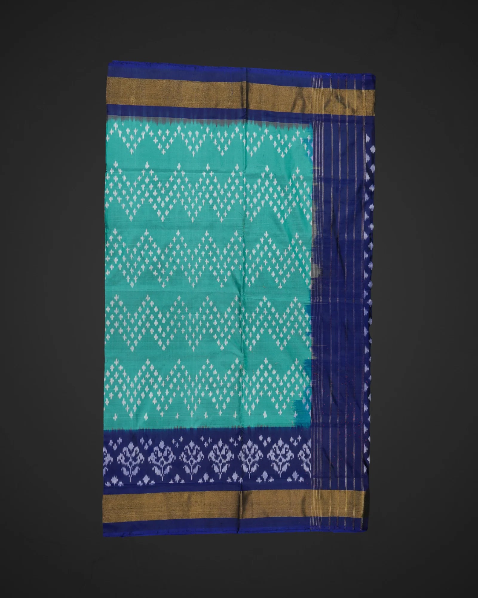 Teal Ikkat Silk Woven Saree