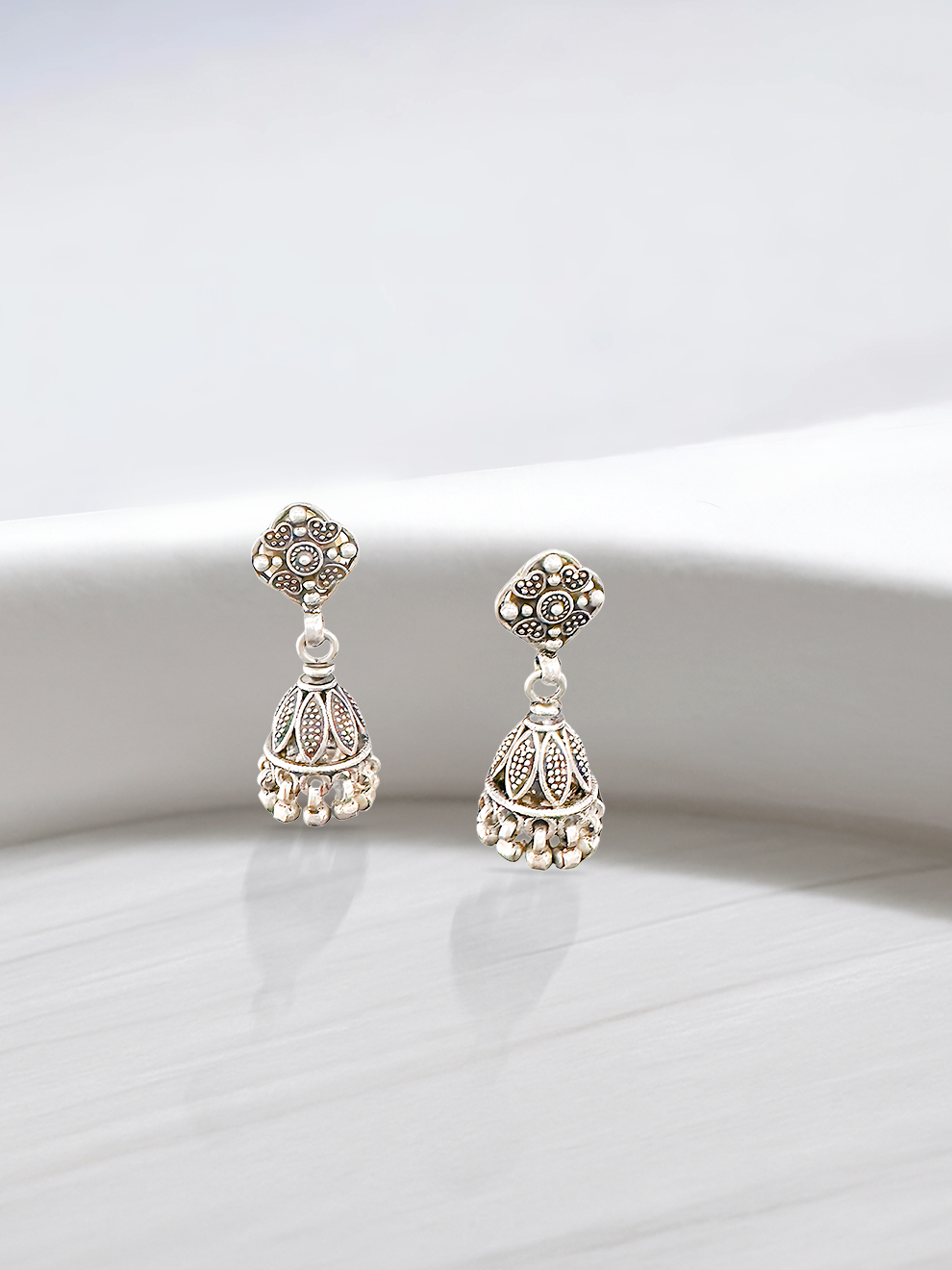 Scent of Silver Jhumkas